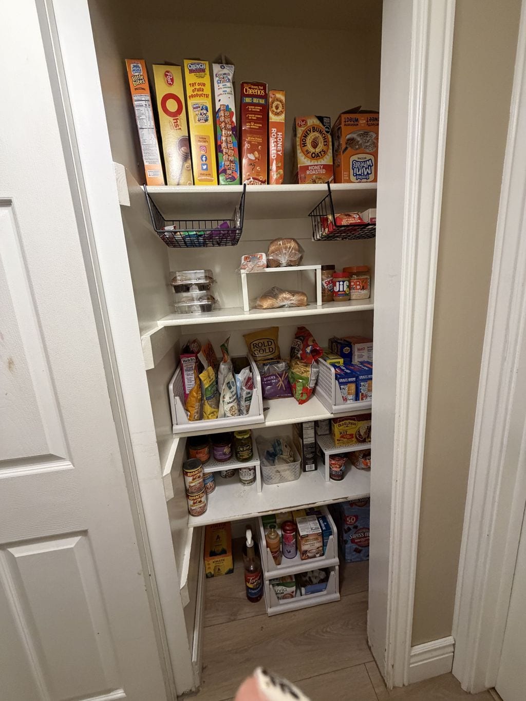 Pantry organized into clear, practical categories after an Edited Spaces project